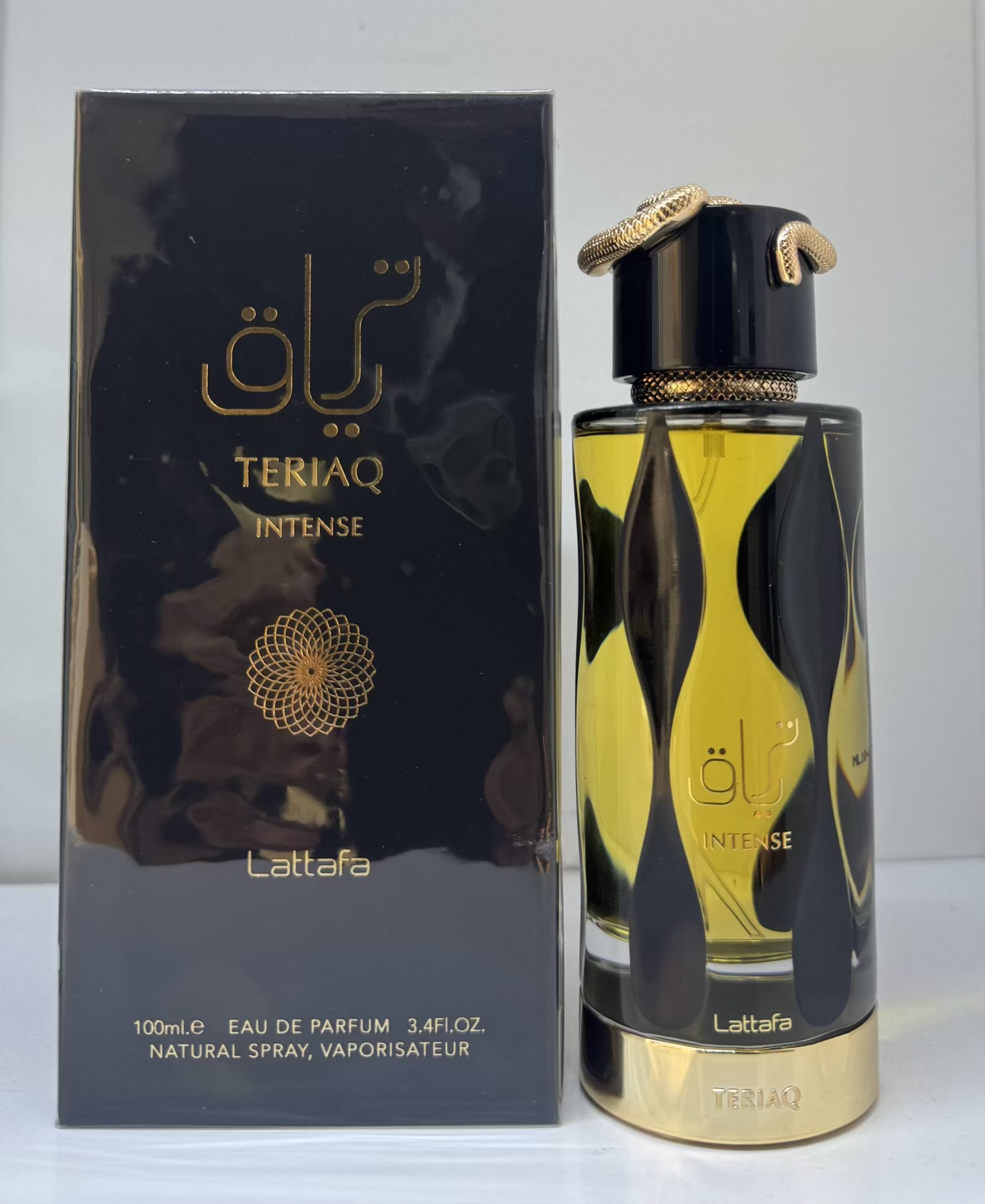 ادوپرفیوم لطافه مدل تریاق اینتنس رایحه تلخ و گرم حجم 100 میل